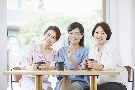 韩国民俗享受下午茶的成年女子背景