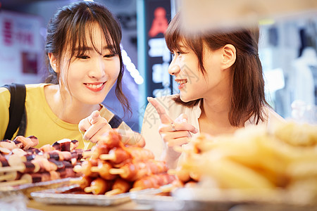 拖延美食家明洞韩国女旅游街头食品图片