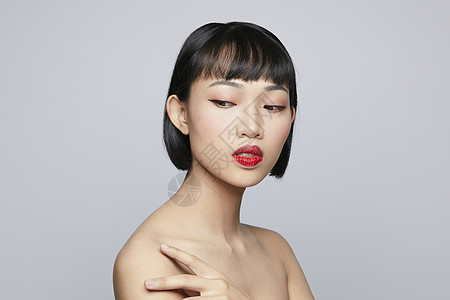 人物剪影短发女胸像灰色人物女美容系列颜色回背景