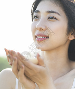 持有浸保湿女美的形象图片