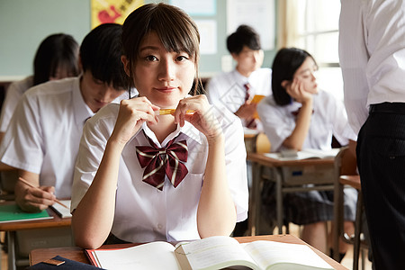 可爱女女士高中生学校生活课图片素材