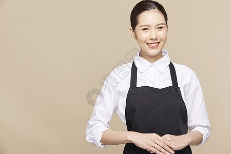 美女兼职穿着围裙的咖啡馆服务员形象背景