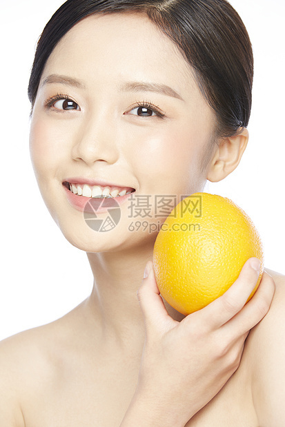 护肤女性与橙子图片