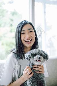 亚洲宠物狗大学生生活与狗女人图片