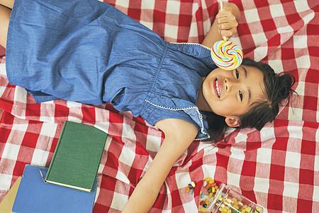 女孩与糖果起居室的女孩子野餐背景
