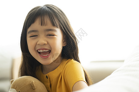 亚洲幸福笑容儿童生活玩具图片