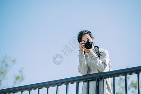 照相机亚洲休息相机和男背景图片