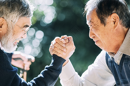 撒旦和耶稣掰手腕背景