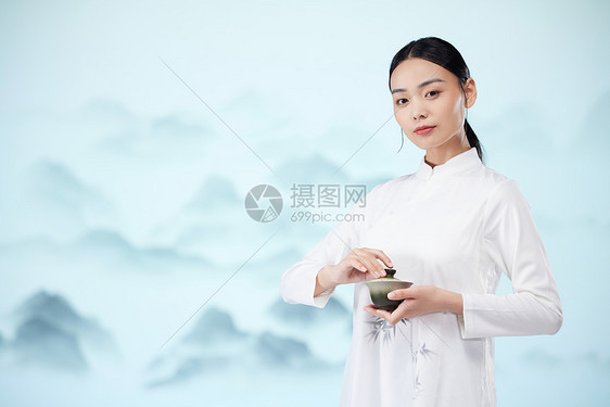 国风美女手端着茶杯图片