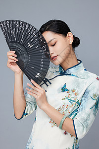古风旗袍美女手拿扇子图片素材