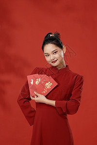 手拿红包的复古新年国风美女背景图片