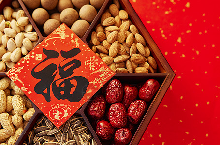 核桃和红枣新年年货静物八宝盆和福字背景