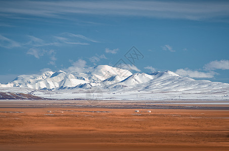 川西甘孜塔公草原的木雅金顶和雪山图片