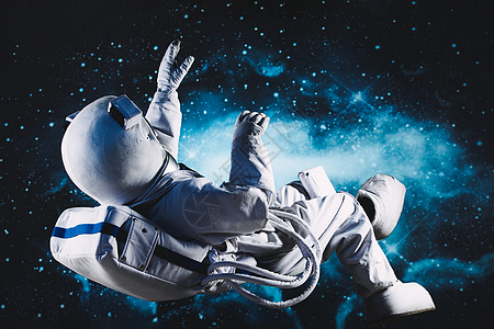 太空中的宇航员创意宇航员太空中悬浮背景