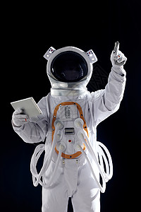 太空中触碰虚拟屏幕的宇航员图片
