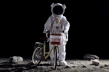 创意宇航员手扶自行车高清图片