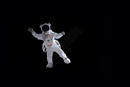 太空宇航员创意宇航员悬浮在太空中背景