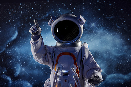 创意宇航员触碰虚拟屏幕图片