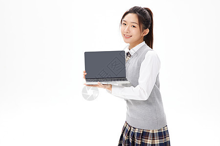 拿着笔记本电脑的青春美女学生图片