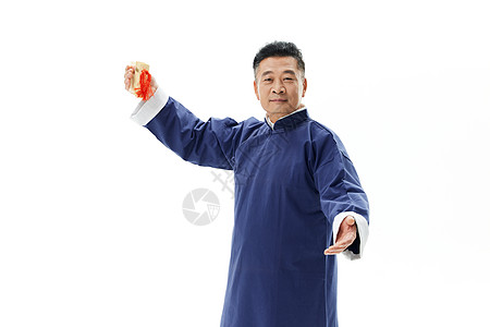 中国风中年男性打竹板背景图片