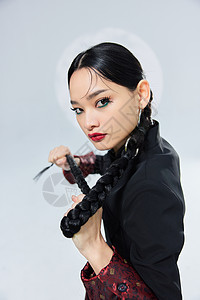 中国文化韵味国朝复古女性手抓辫子背景