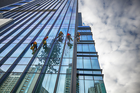 劳动工人深圳城市建设者中的高空作业者背景