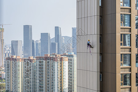 深圳城市建设者中的高空作业者背景