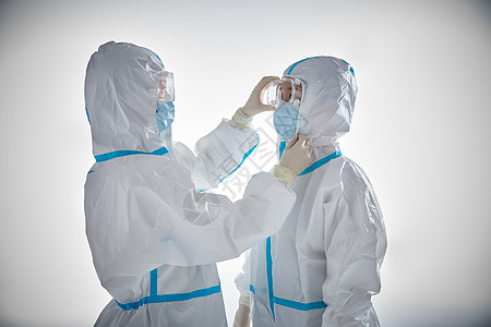 温暖健康医护人员穿戴防护服背景