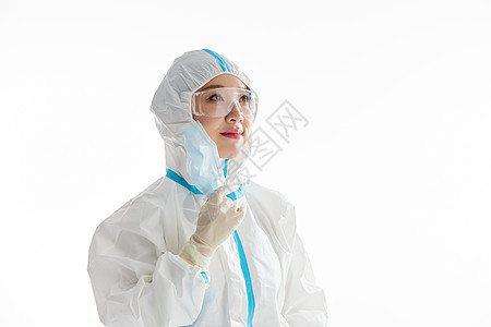 穿防护服的防疫医护人员摘下口罩图片