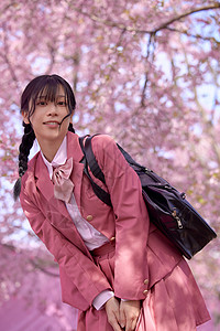 日本 樱花美女大学生初春赏樱花背景