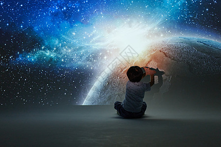 小男孩体验宇宙星河背景图片
