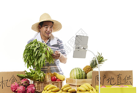 中年男农年直播售卖水果蔬菜背景图片