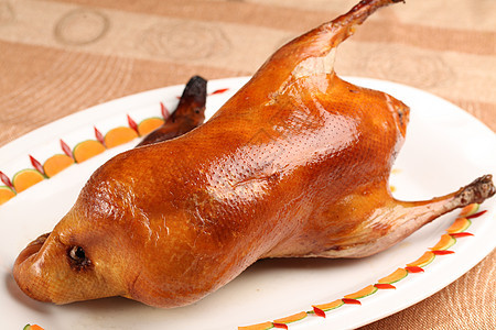 宫廷红枣木烤鸭背景图片