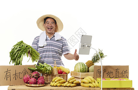 男性果农在线上卖蔬菜水果背景图片