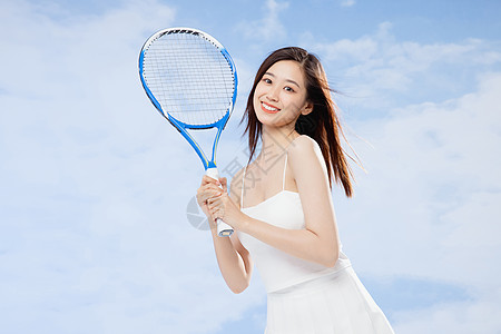 夏天美女手拿网球拍的活力女孩背景