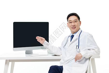 医疗专家坐在电脑前会诊背景图片