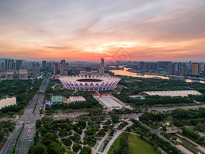 世纪莲体育中心广东佛山世纪莲日落晚霞风光背景