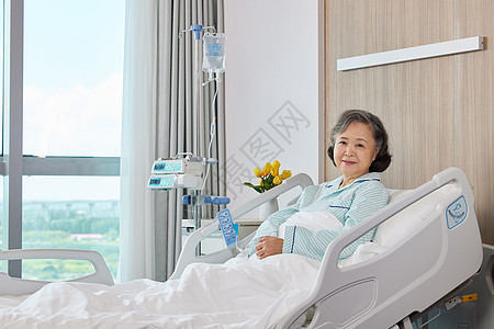 生病住院卧病在床的老人形象图片