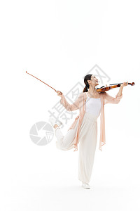 拉小提琴的艺术女性演奏家图片