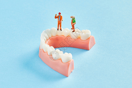 保护牙齿的创意小人概念图片
