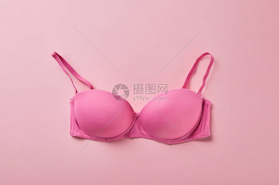 粉红背景胸罩的顶部视图图片