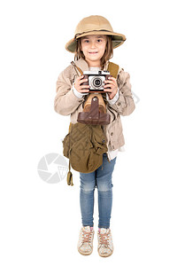年轻女孩拿着相机玩着Safa图片