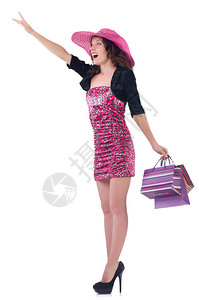 女孩在白衣粉红裙子和巴拿马餐服的纸袋上畅销精美购图片