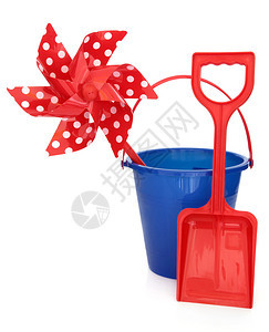 蓝塑料沙滩玩具桶红烟囱和白底波图片