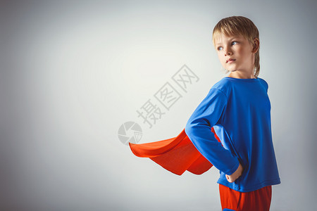 穿西装的小男孩超人背景图片