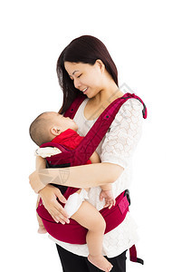 妈用婴儿背带抱着婴儿图片