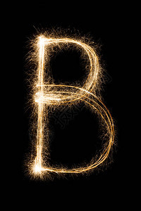 英文大字母B由黑色背景上的燃烧火花制成闪亮的节日派对烟花字体图片