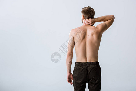 无上衣男子的背部颈部疼痛图片
