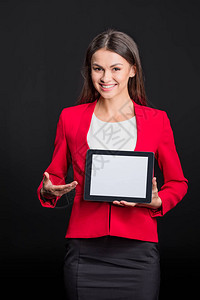 年轻商业女青年展示数字平板电脑图片