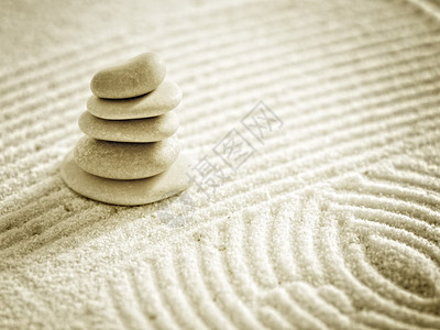 沙子背景上的几块禅石背景图片